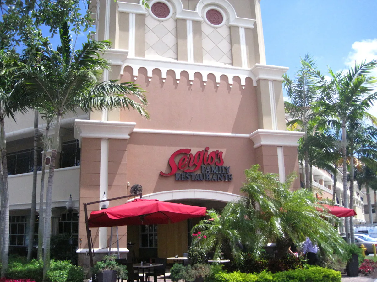 a building with a red umbrella